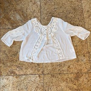 Ivory colored blouse size medium.